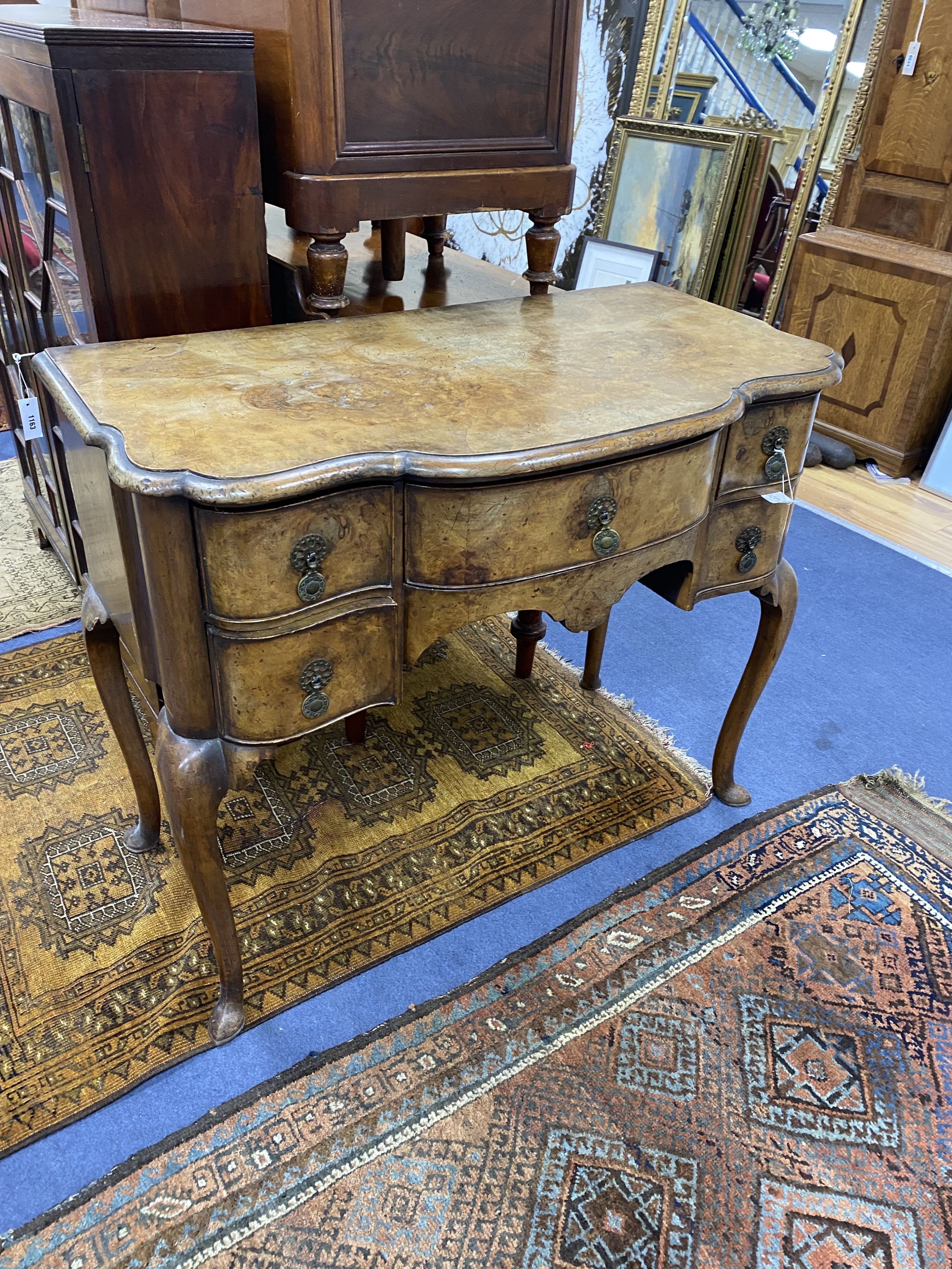 An 18th century style Dutch walnut bow front side table, width 91cm, depth 49cm, height 76cm